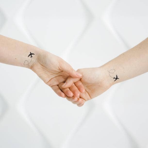small tattoos with big meanings airplane