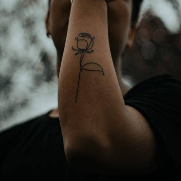 50 Simple & Elegant Tattoo Ideas For Women | Elegant tattoos, Tattoos for  women flowers, Tattoos for guys