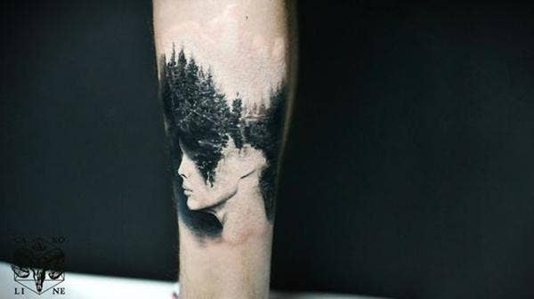 a double exposure tattoo of a person and the forest by | Stable Diffusion