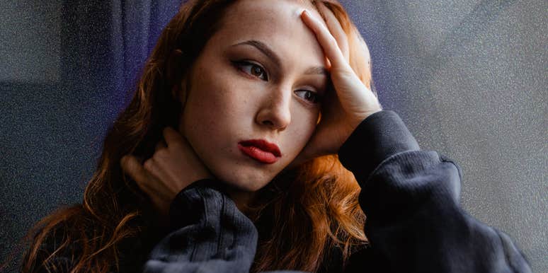 Woman contemplates the warning signs she is in a seriously abusive relationship.