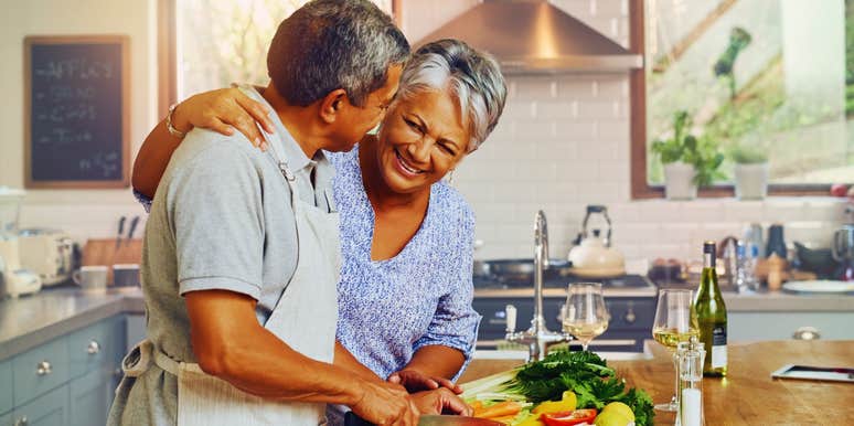 Woman and man cook together and man is falling for her because of her green flags.