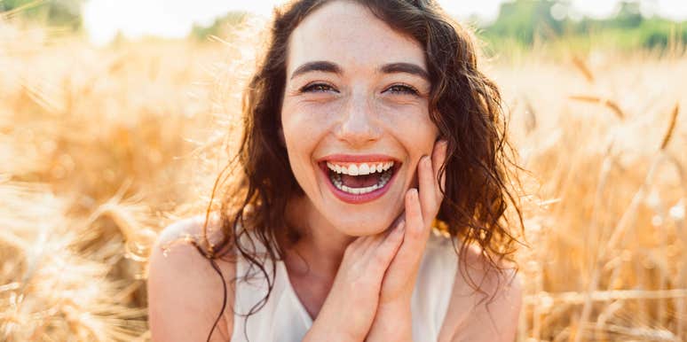 beautiful woman smiling big