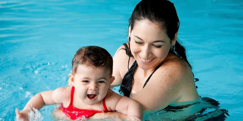 mom at swim lesson with baby