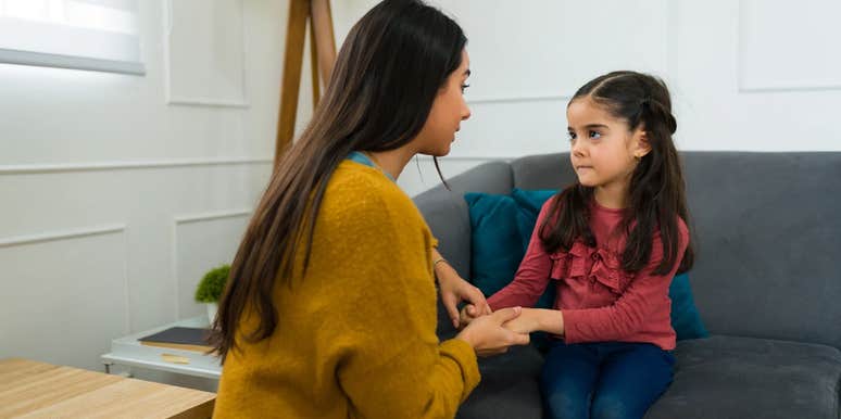 Mom teaching her daughter about stranger danger