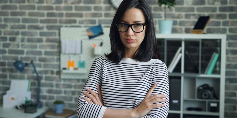 gen z worker looking upset in the workplace