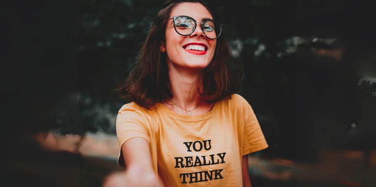 Smiling woman finding happiness in her life.