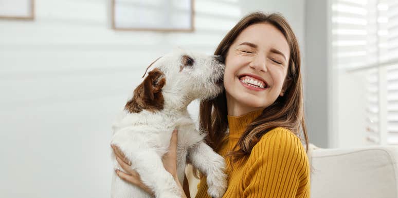 Dog showing love to their owner