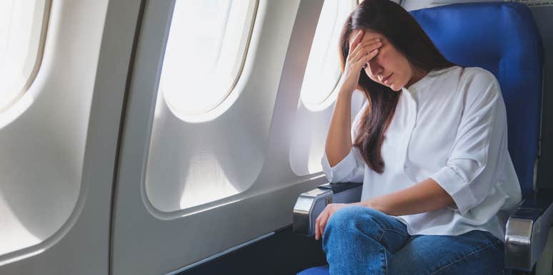 Annoyed woman on airplane