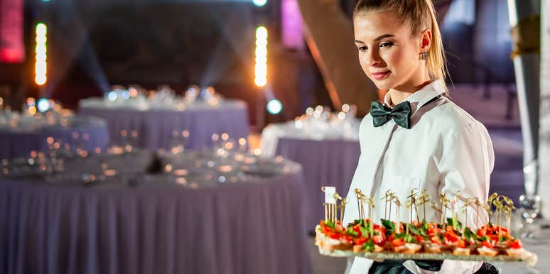 Catering server at wild wedding