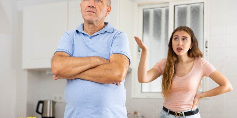 daughter and father arguing in kitchen