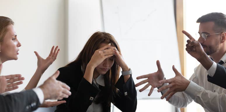 group of workers arguing with each other