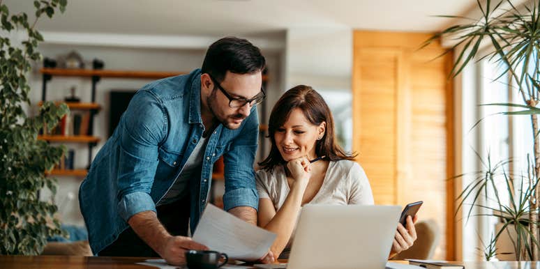 Husband and wife looking at finances