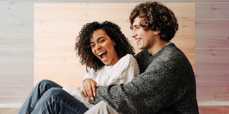 Couple in love, man wrapping his arms around woman.