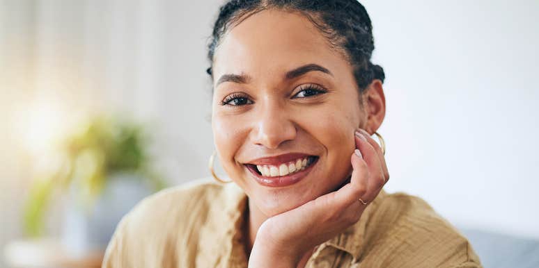 smiling happy woman wearing a watch