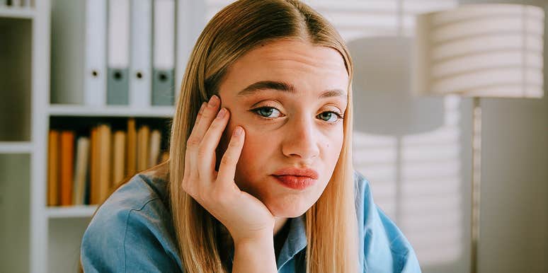 Unimpressed woman deciding to ghost someone. 