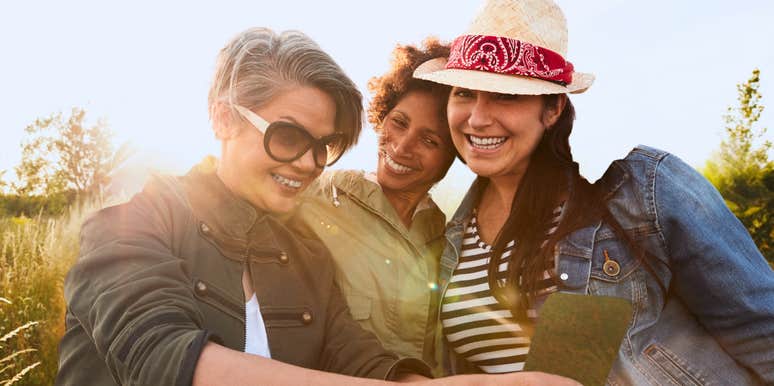 Three women in their 40s and 50s making joyful decisions about life