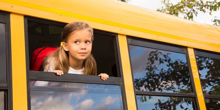 Little girl alone on the school bus