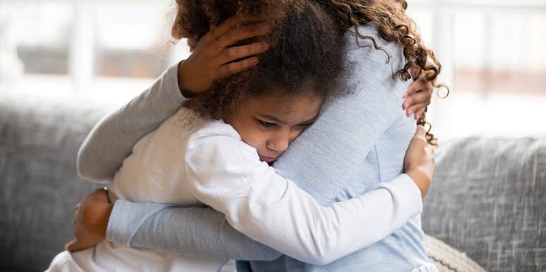 Mom hugging her stressed kid