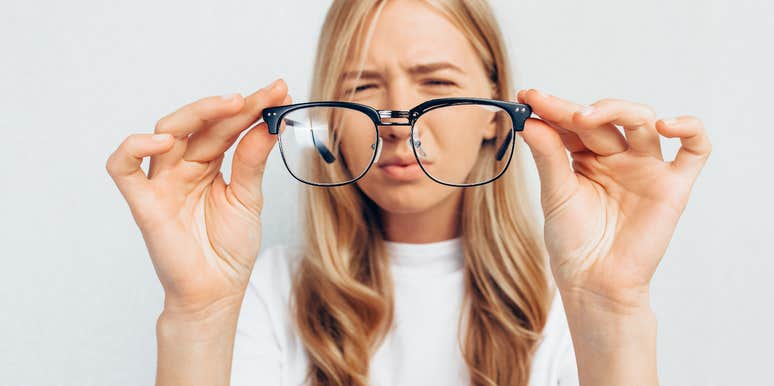 Woman with poor vision squinting