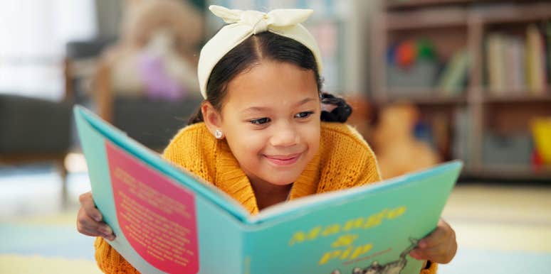 highly intelligent little girl reading