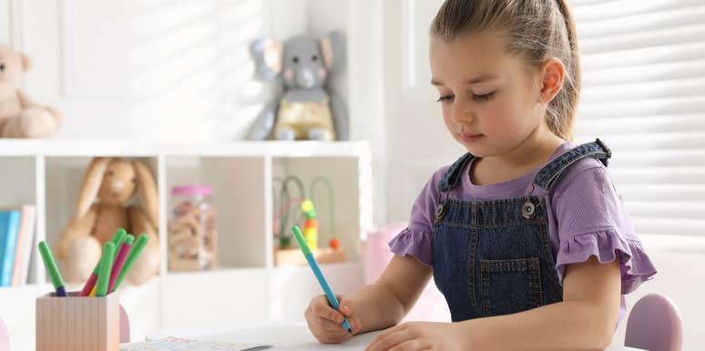 Goddaughter writing thank you card