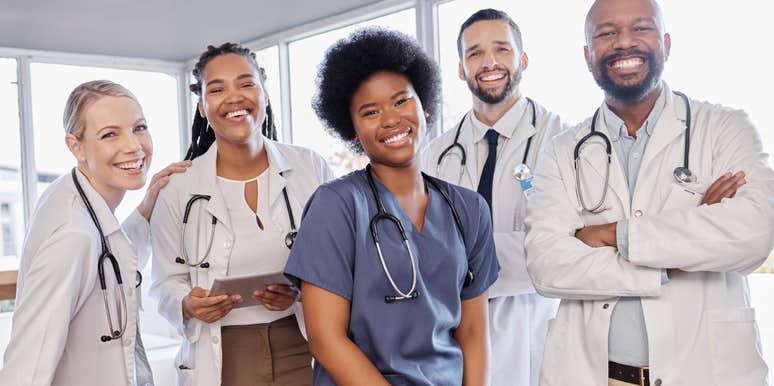 Group of doctors smiling explaining what they won't let their kids do