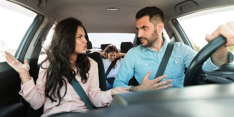 Husband and wife having argument in car about the gas