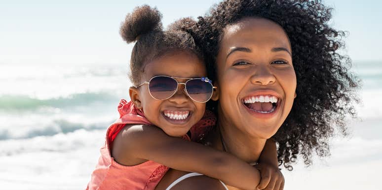 Black daughter hugging mom who was depressed 