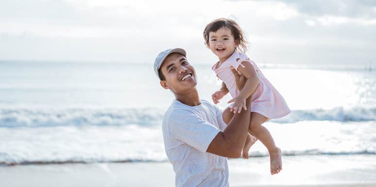 Dad and daughter at the beach for Dadurday tradition