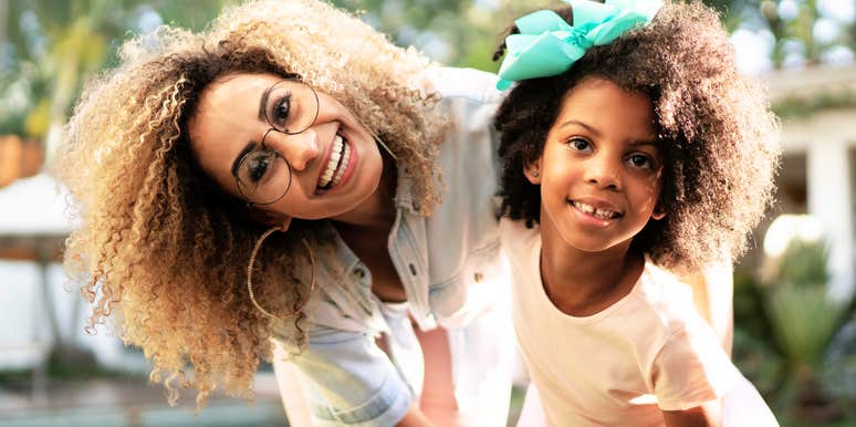 Single mother with her happy daughter. 