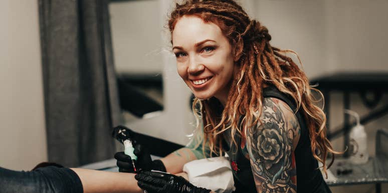 tattoo artist smiling