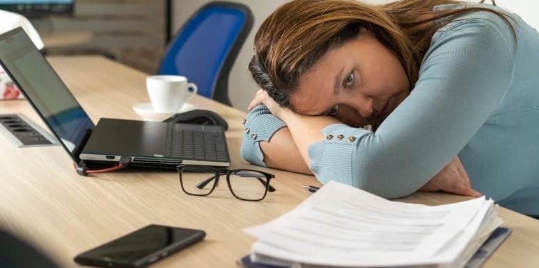 woman trying to work while dealing with personal tragedy