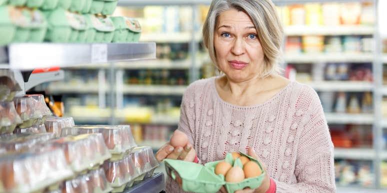 Woman annoyed that eggs are so expensive