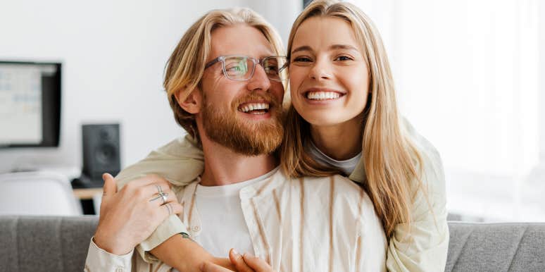 happy man and woman expressing attraction