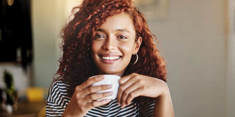 Woman with curly hair has unique qualities and magnetic appeal