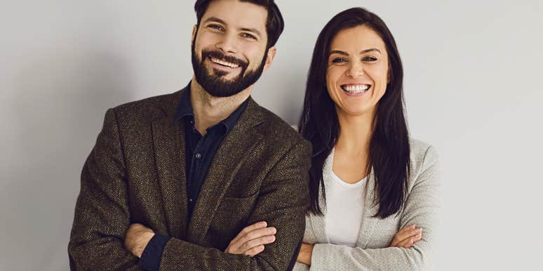 Brunette man and woman learning to trust after uncomfortable conversations