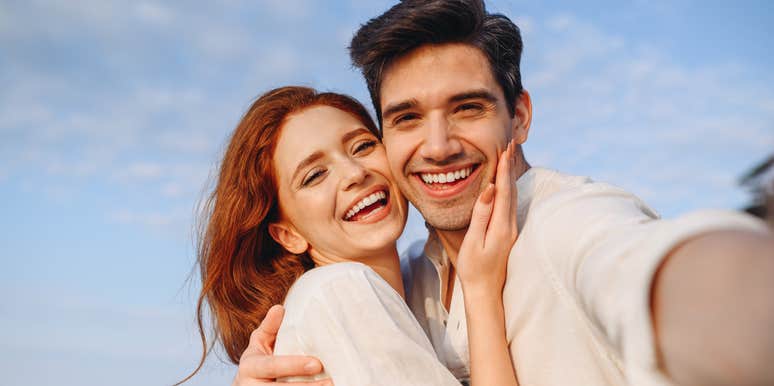 loving couple husband holding wife smiling