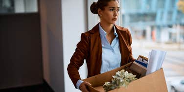 employee quitting job packed up box