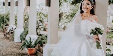 bride in wedding dress smiling