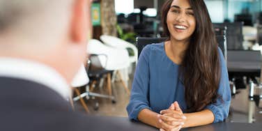 woman smiling during job interview