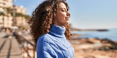 woman feeling free and lucky