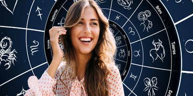 happy woman with astrological background