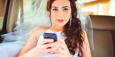 bride reading her fiance's texts