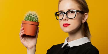 Woman holds a cactus and finds out her man is one.