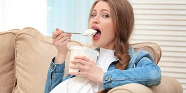 Pregnant woman eating ice cream