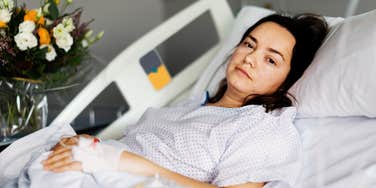 Woman in hospital bed