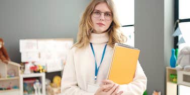 Young preschool teacher in classroom