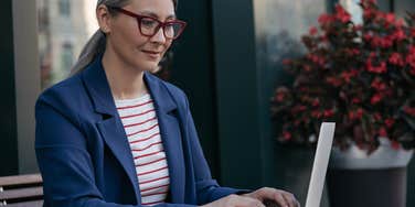 Woman happily working remotely