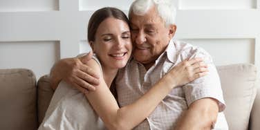 Young woman is friends with an elderly man