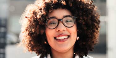 Confident woman smiling